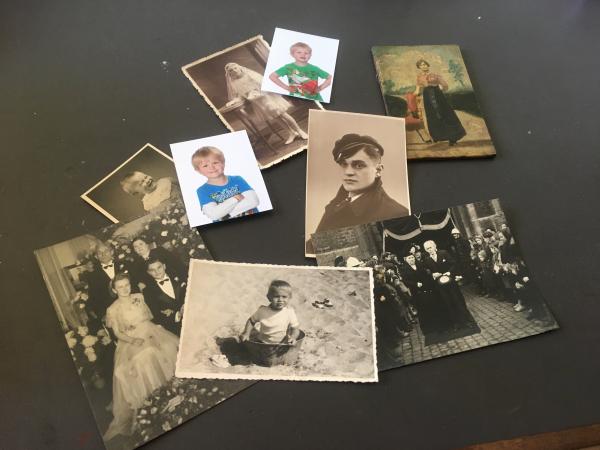 pagina uit een fotoalbum met verscheidene leden van de familie